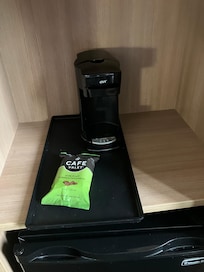 Coffee and maker. No cups.
