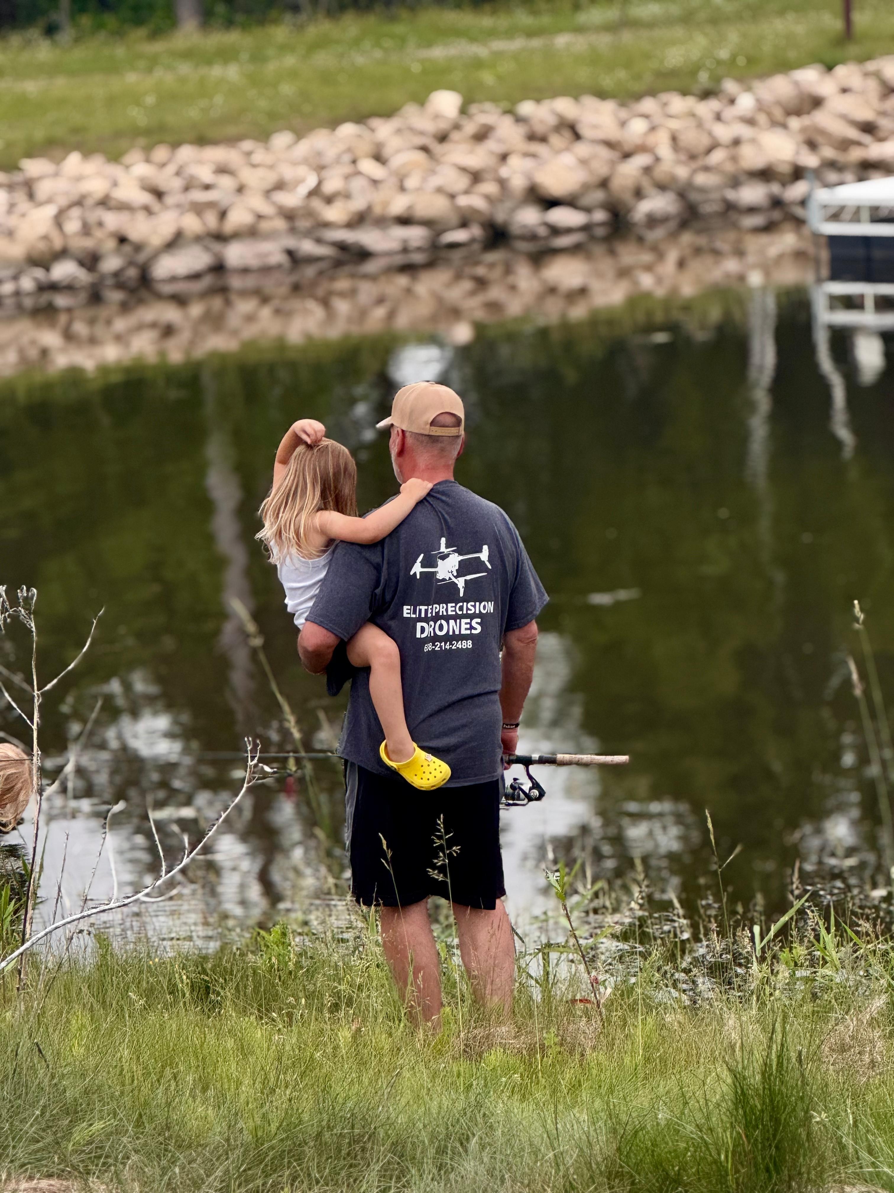 Papa and our young fisher girl. 