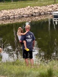 Papa and our young fisher girl.