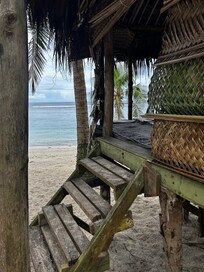Traditional fale right on a beautiful beach