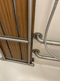 Mold on pull down seat in bathtub