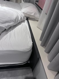 Our bed is against the window no real headboard we hit our heads a couple times during sleep