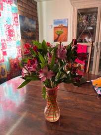One of two fresh flower arrangements