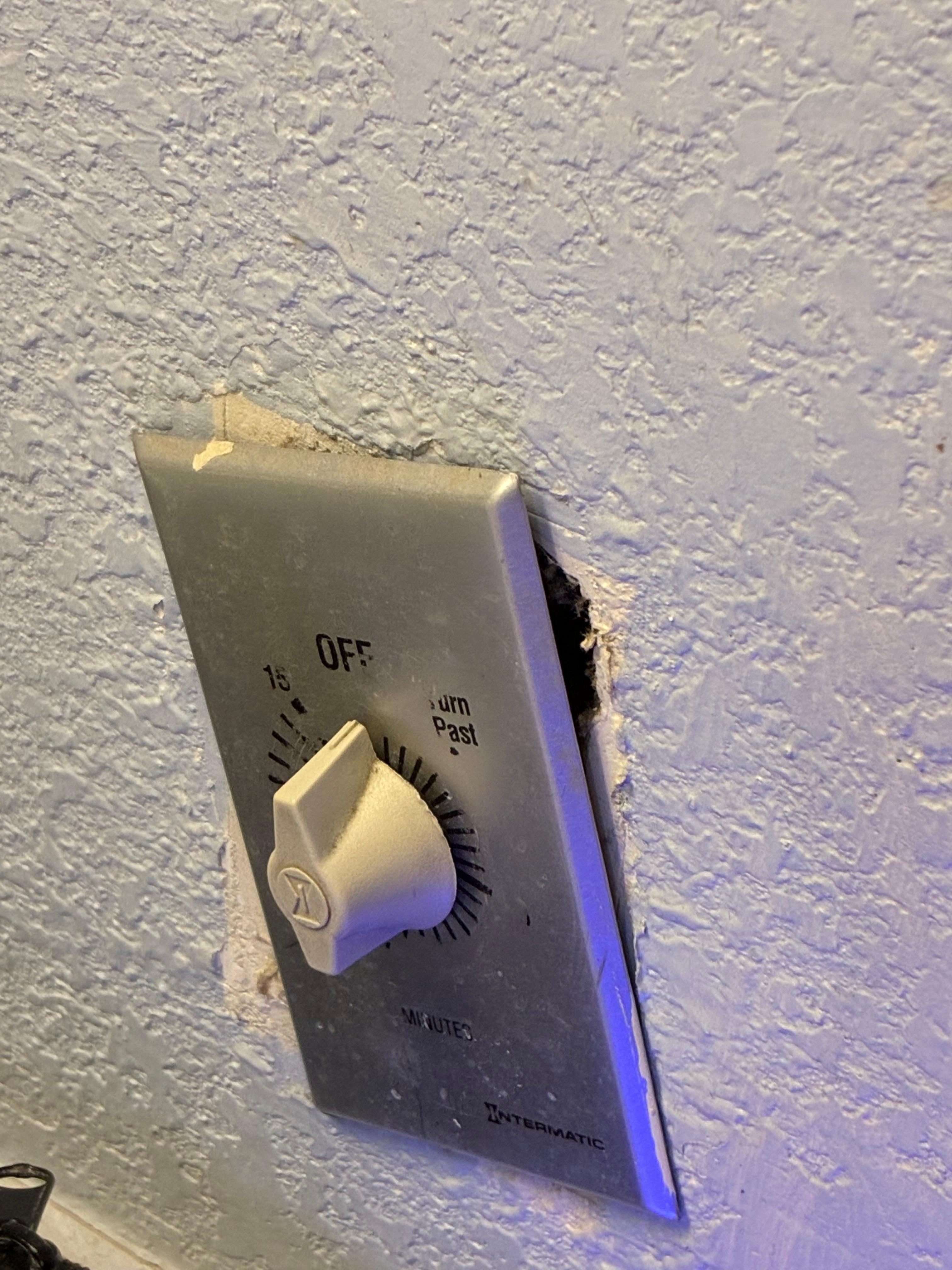 Heat lamp with exposed backing. Very unsafe, and outdated.