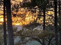 Sunset looking from clifftop back yard.