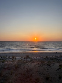Sunrise Saturday morning from our ocean front room. Great view!
