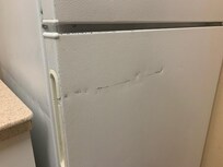 Damaged refrigerator