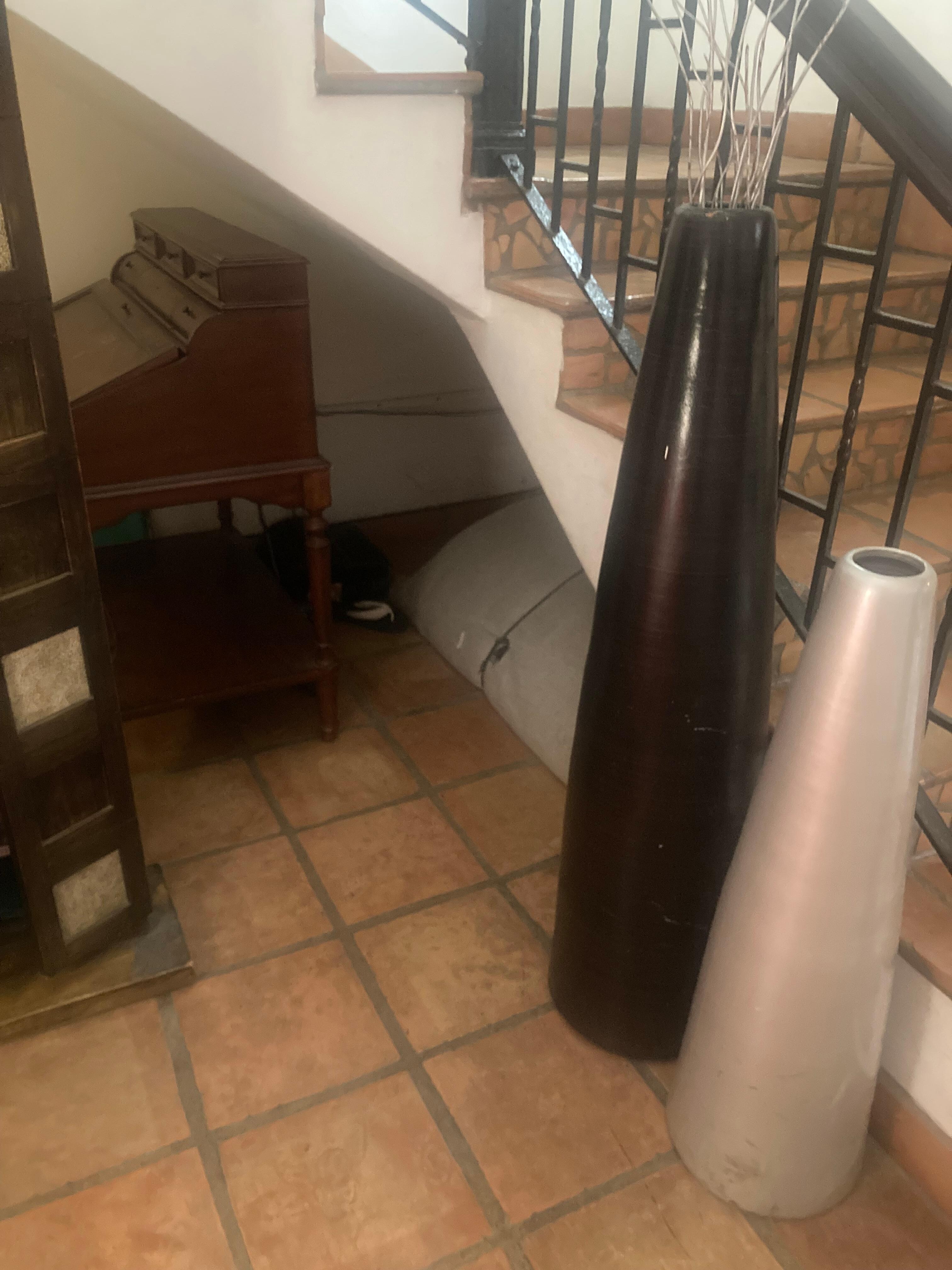 Luggage hold under stairs 