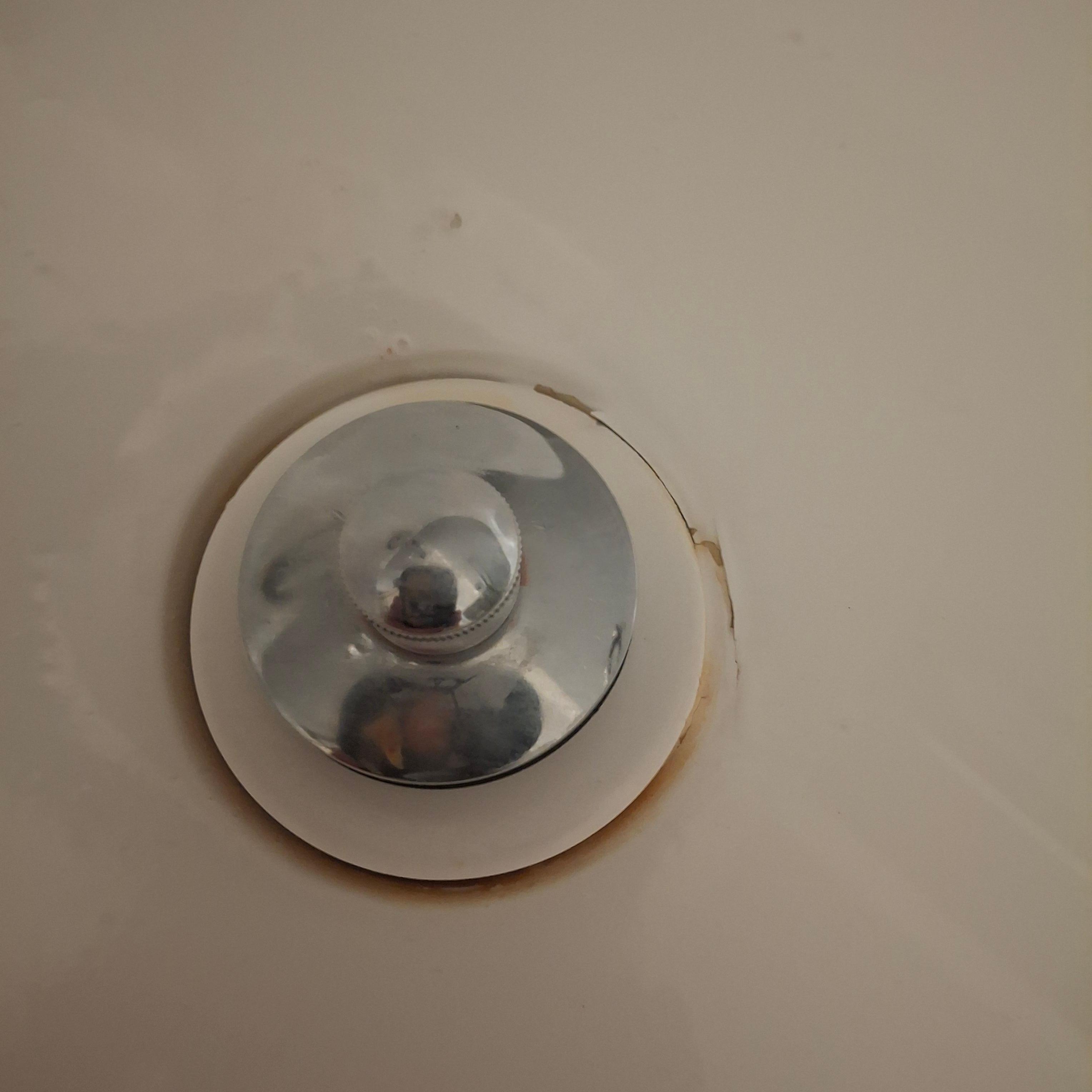 The tub after I cleaned it, with sanitizer wipes, tub was cobbled together with pain and tape.