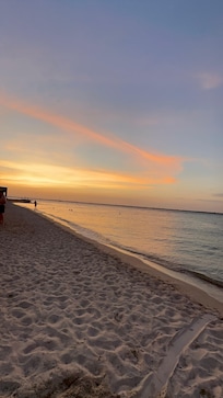 Watching the sunset from the beach, close proximity to the hotel