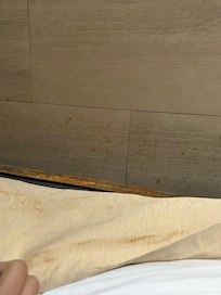 Rust or something on the headboard.