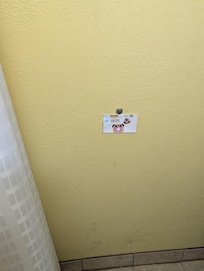 This sign was taped to the bathroom wall.