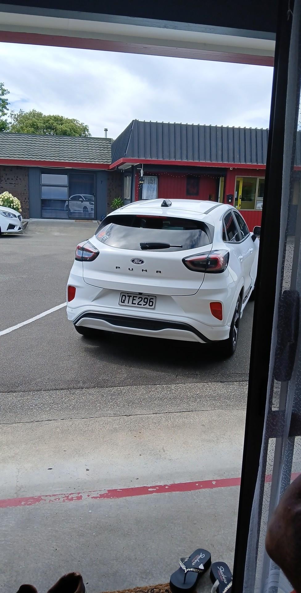 Parked outside the motel