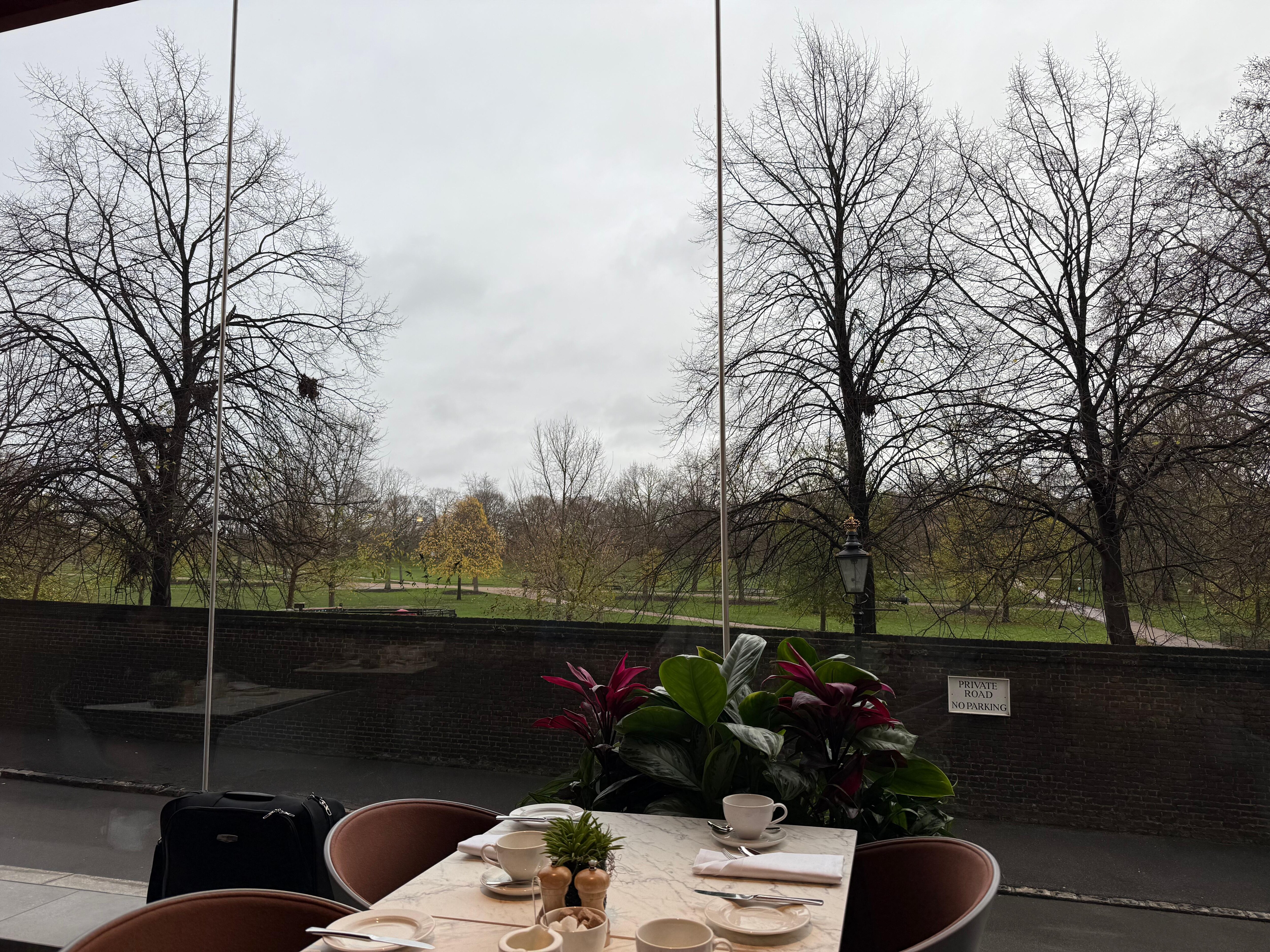 Breakfast is served in the Origin restaurant. It overlooks the access road to Kensington Palace and Hyde Park. 