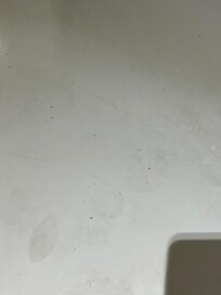 Dirty floor of shower.