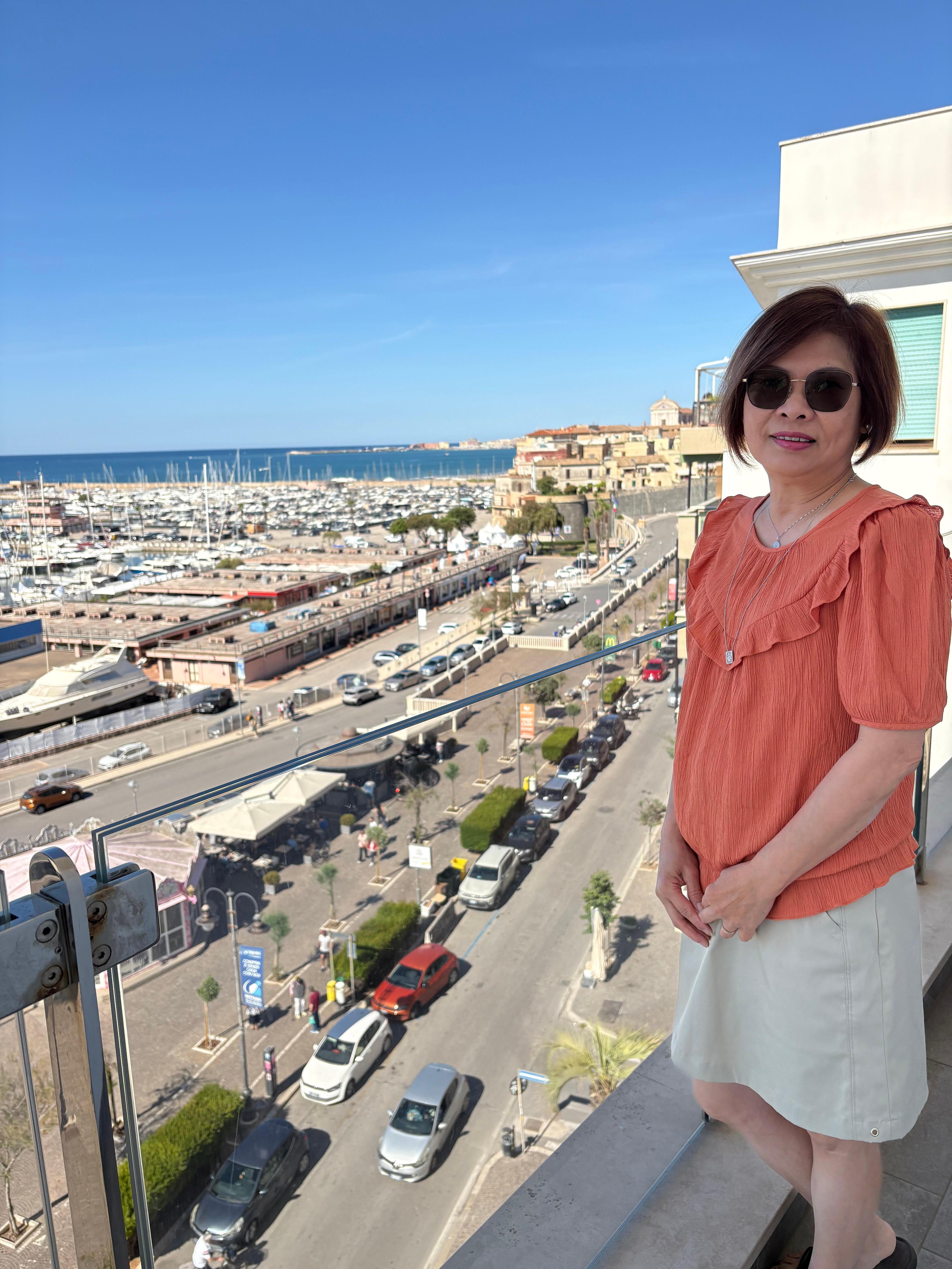 Enjoying the beautiful view at the balcony where we had the breakfast