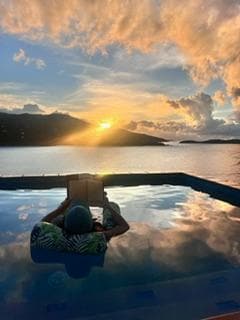 Reading in a pool of clouds.