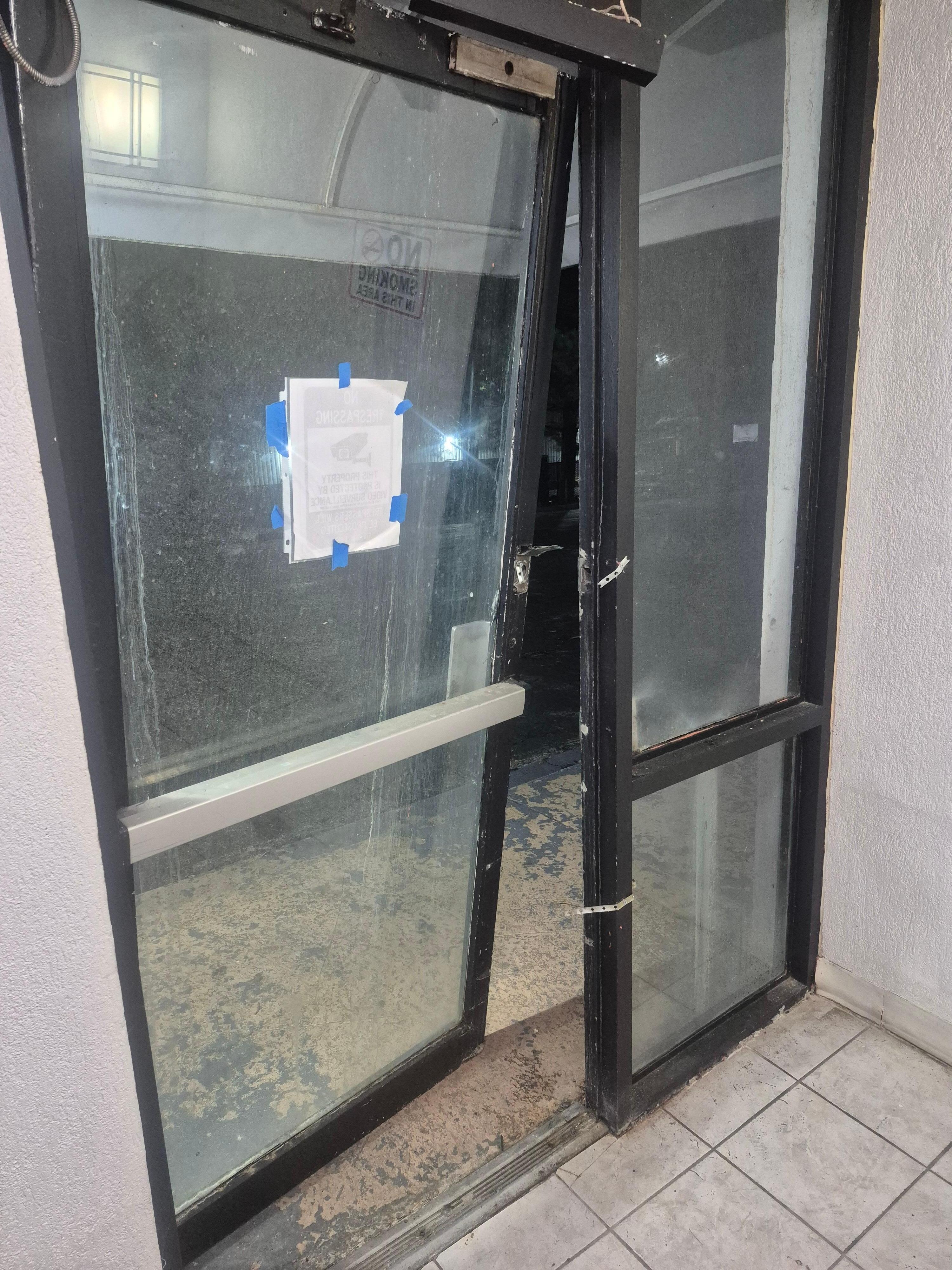 Outside security door...