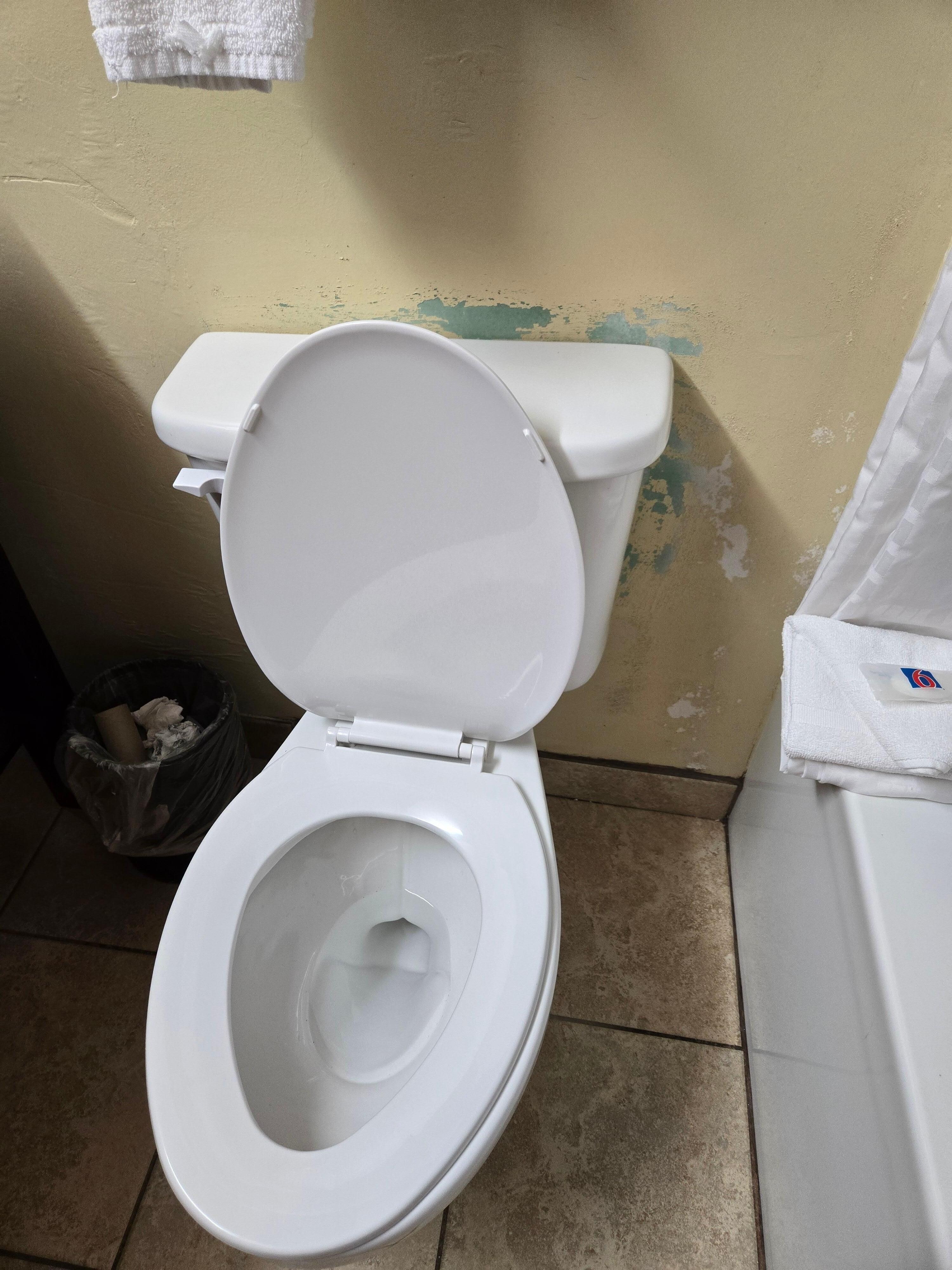 Paint missing and filth on the wall