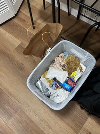 There was another large bag on top aswell, both just sitting in the middle of the kitchen.