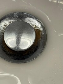 Rusty and dirty around the drains