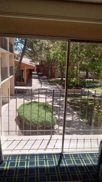 Room view of courtyard. Indoor pool, gym , hot tub in courtyard area