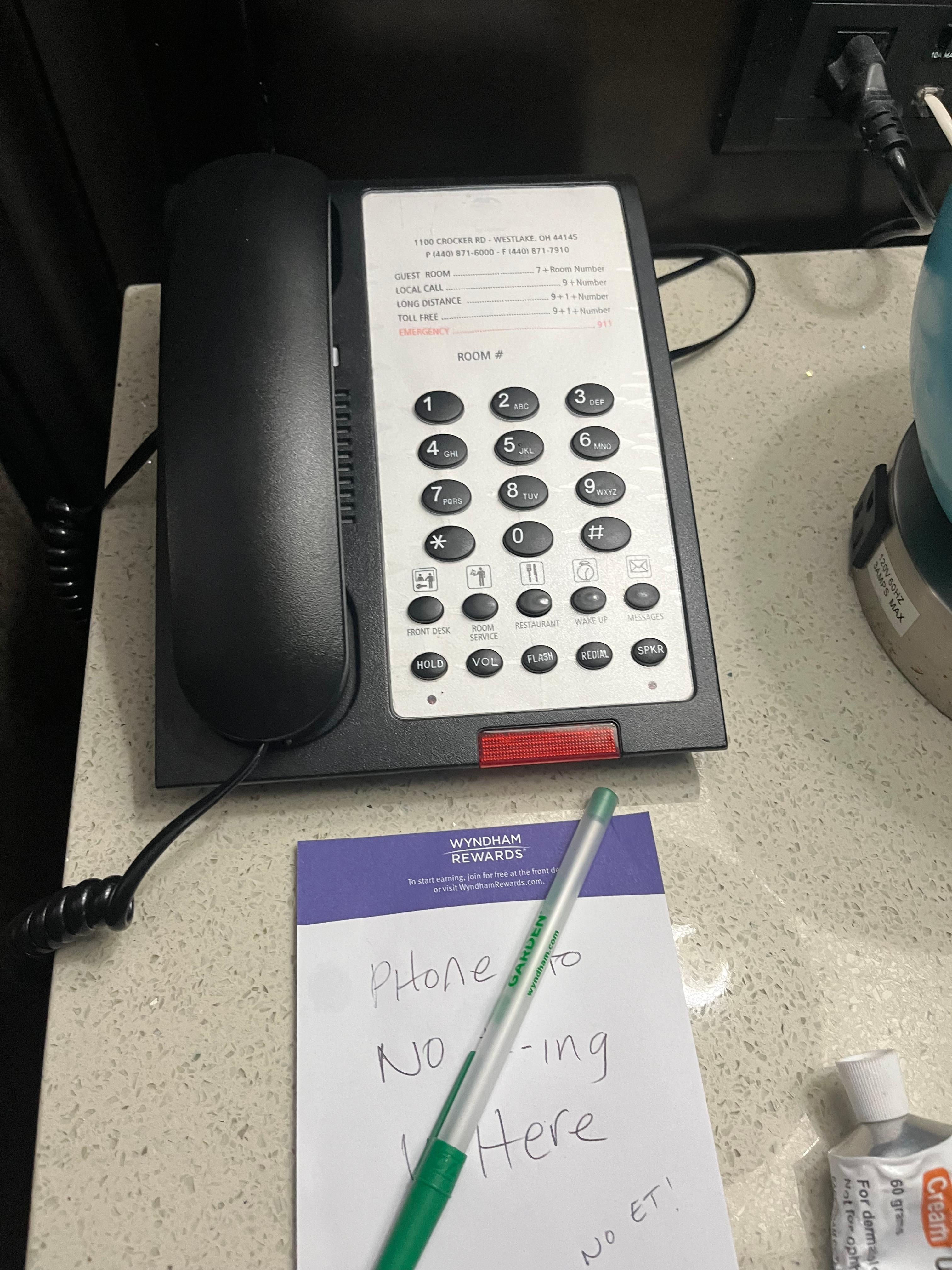 Call the desk to tell them about problems. Oh, the phone doesn’t work. 