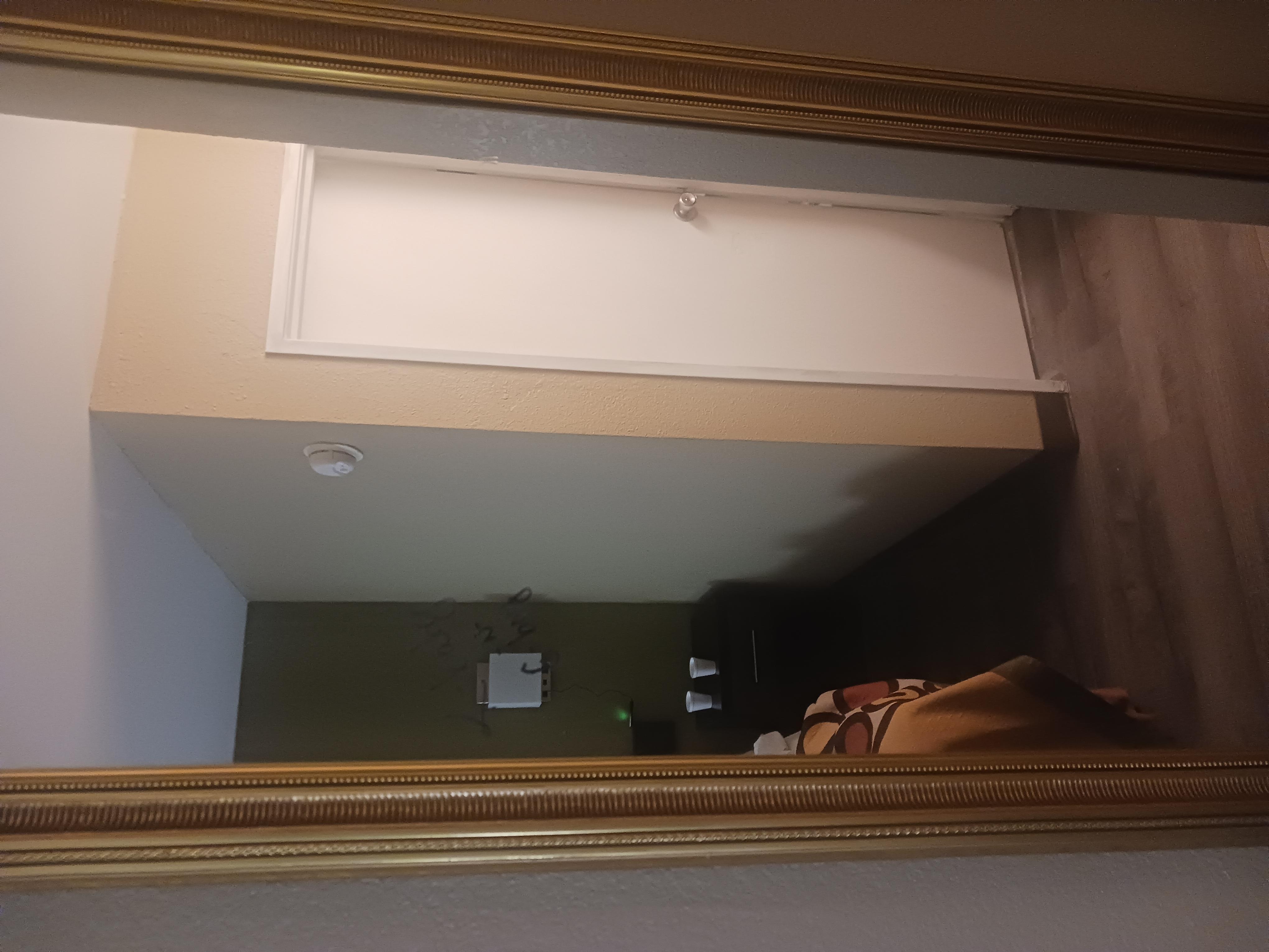 Mirror needs cleaning. Poor house cleaning all round 