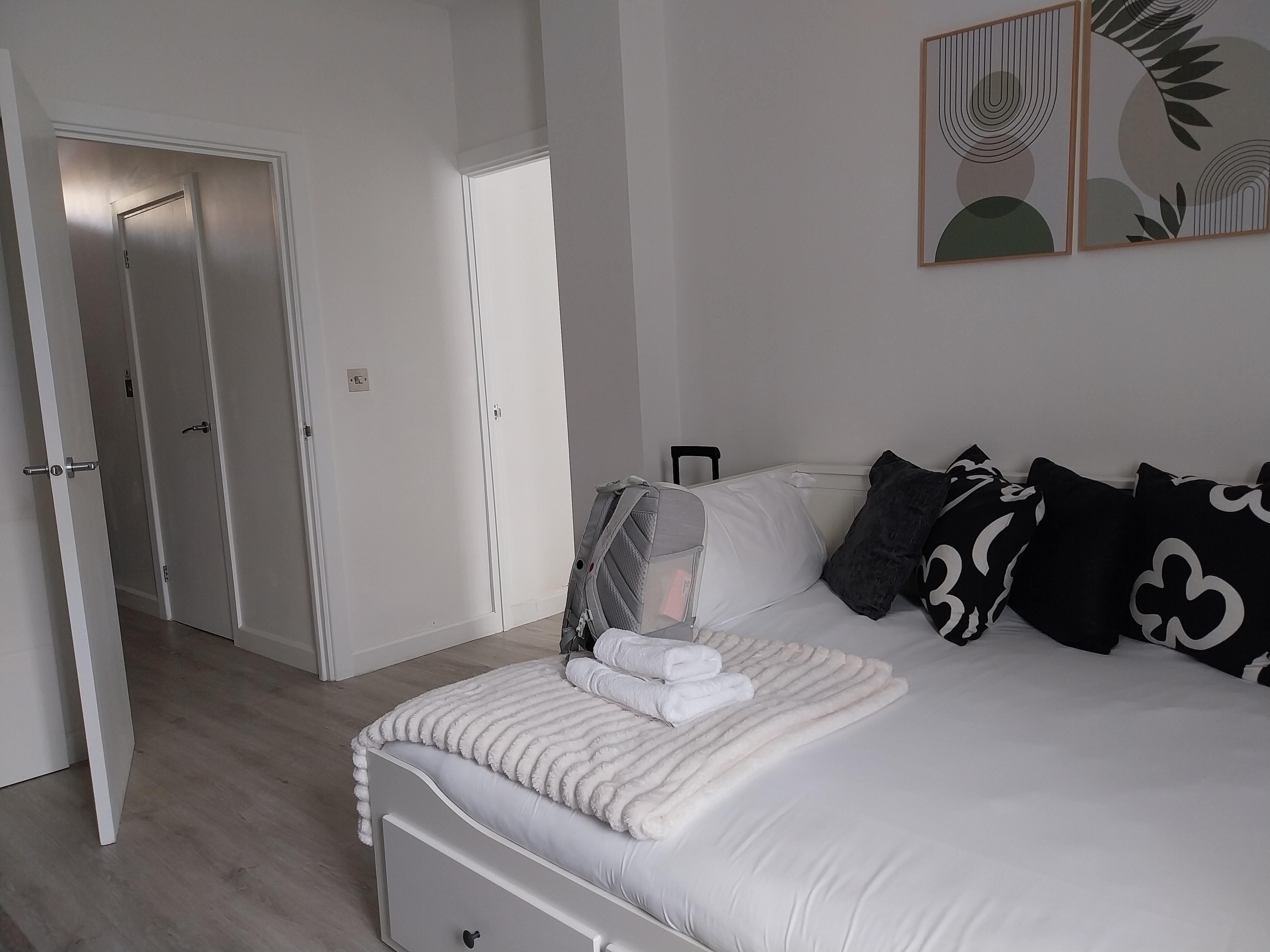 The livingroom converted into a second bedroht.