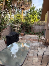 Outdoor porch. Great for dining or just hanging out. Had enough space to set up an easel and paint.