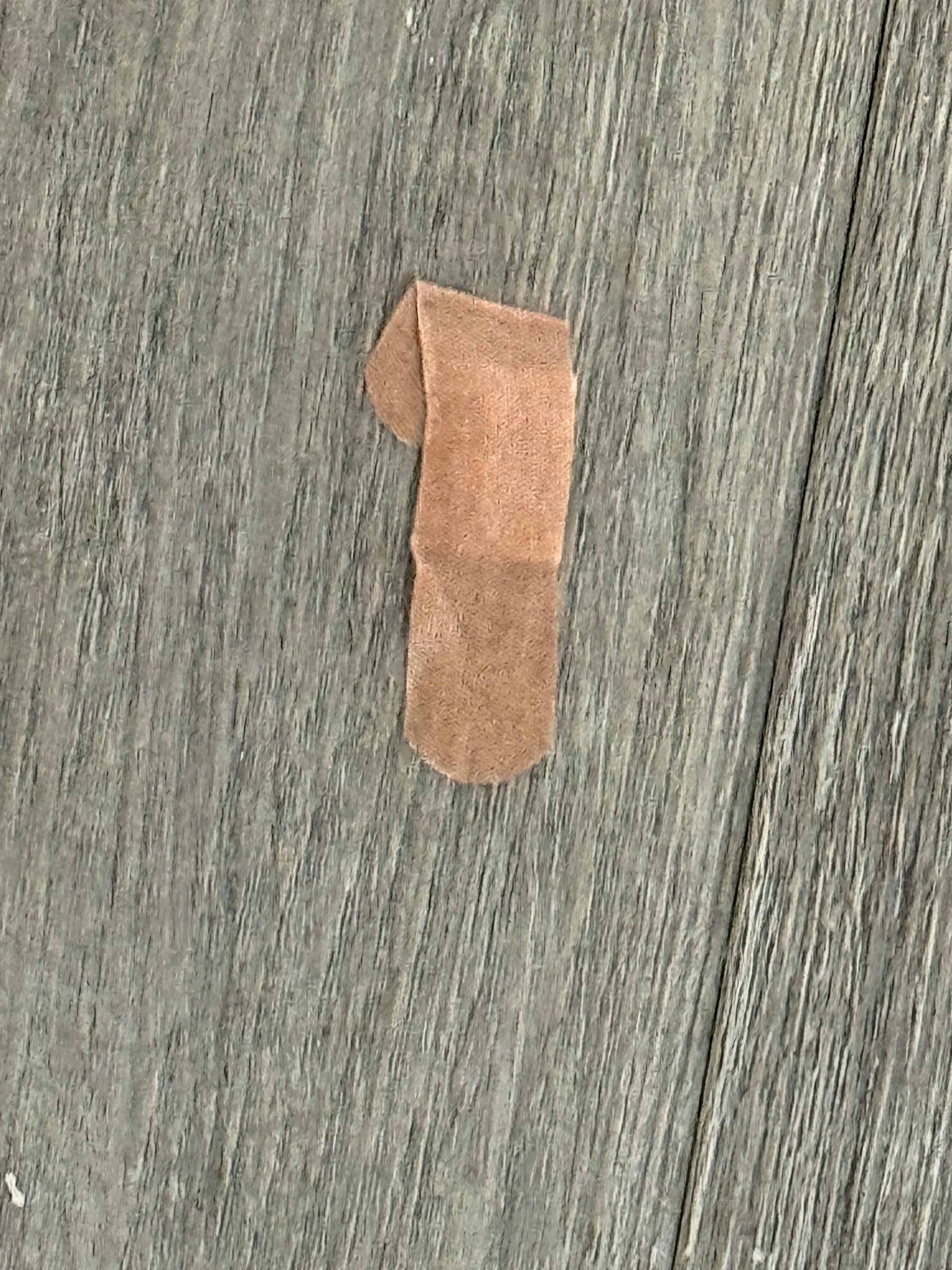 This bandaid was stuck to the floor in the hallway for 4 days! Gross!