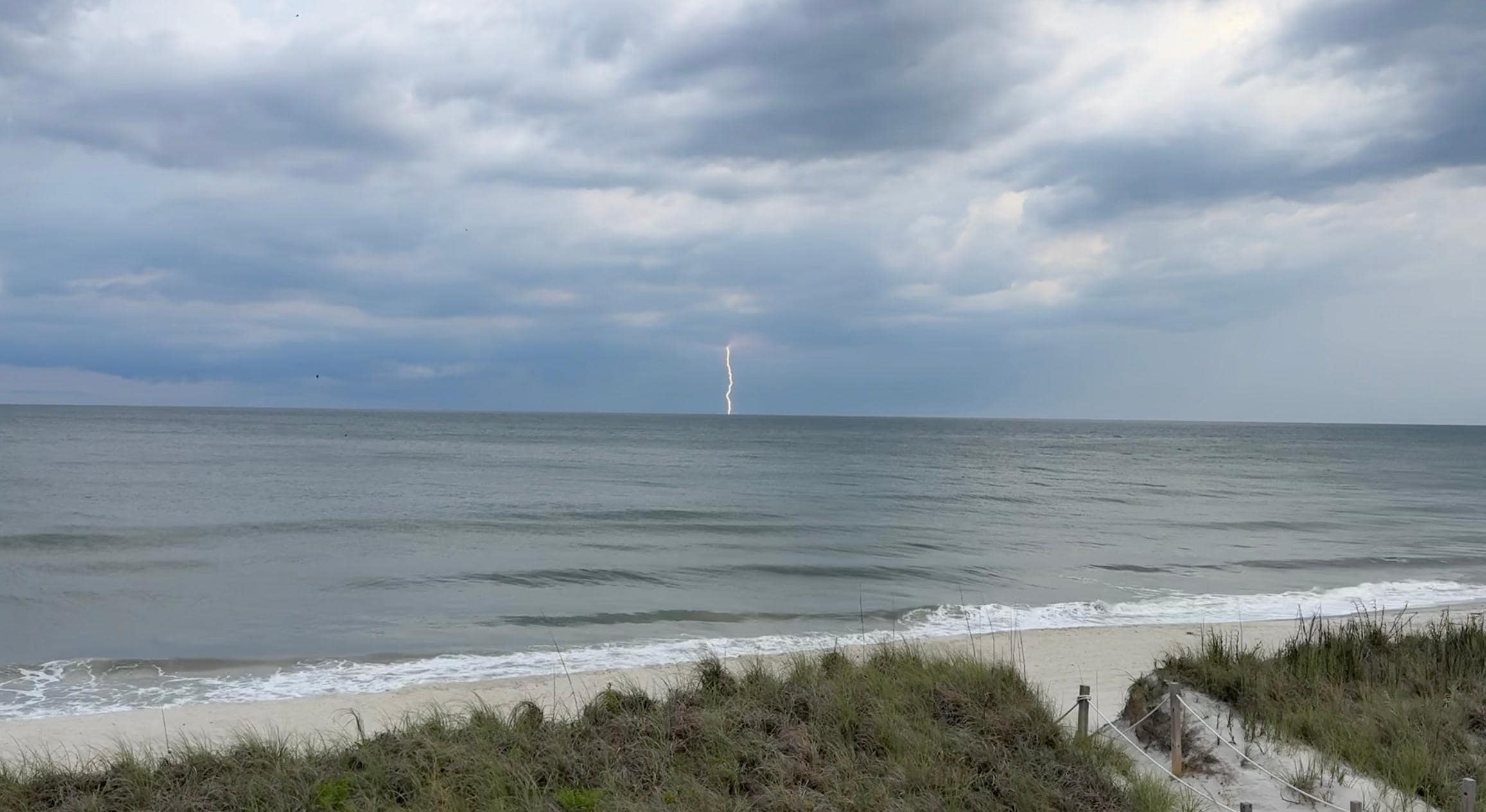 View from back porch at a storm out at sea