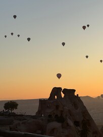 View of hot air balloons from the terrace, Petra Inn