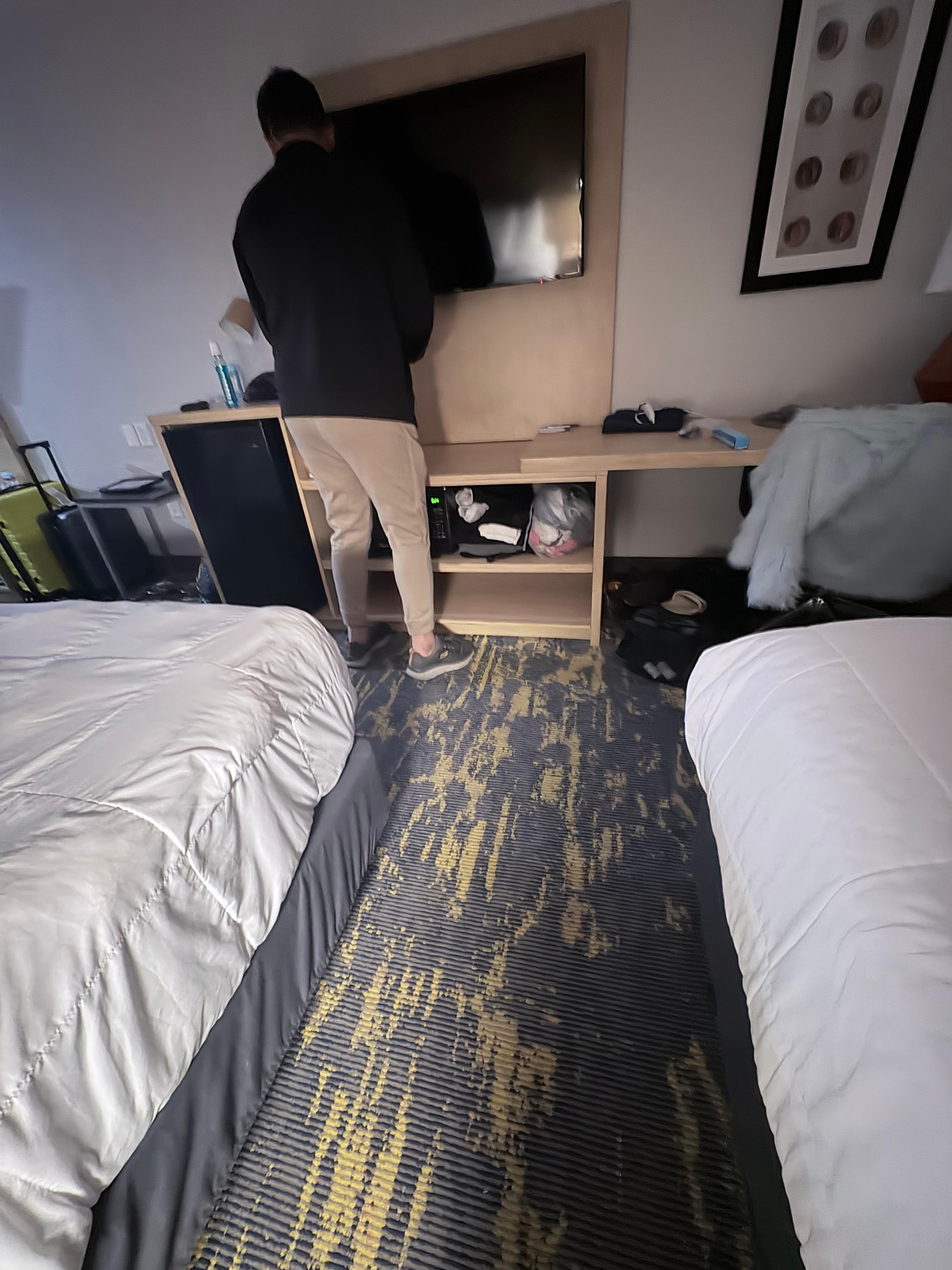 Employee trying to “fix” tv after initial complaint was told and tv wasn’t fixed all day . He did move us to another room and at least try to find a solution because the female employee that had no resolution but an attitude did nothing expect say no