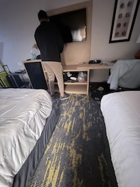 Employee trying to “fix” tv after initial complaint was told and tv wasn’t fixed all day . He did move us to another room and at least try to find a solution because the female employee that had no resolution but an attitude did nothing expect say no