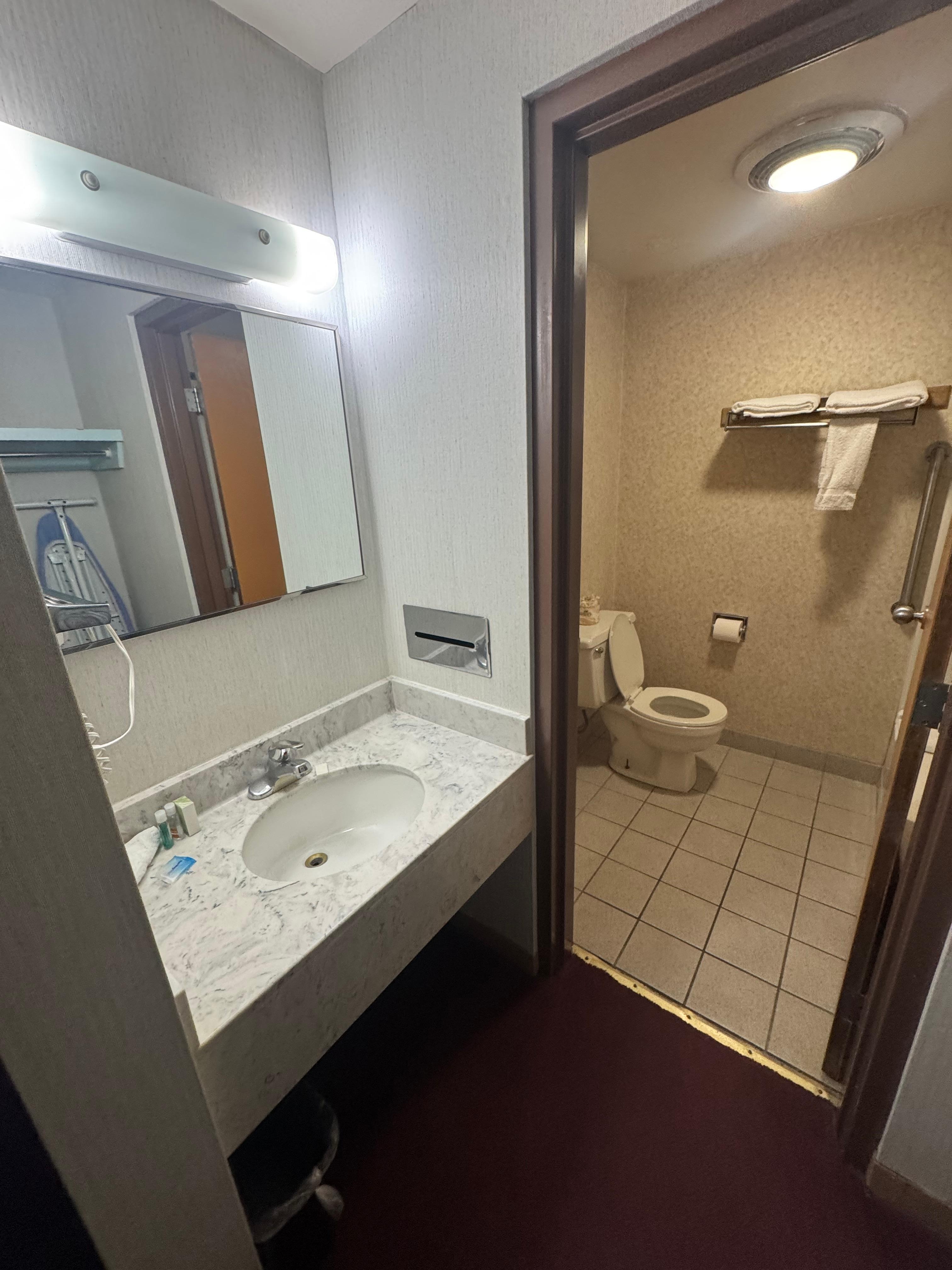 Sink hadel was loose , again cracks in the paint patched holes in the walls 