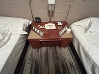 No USB, curtain controls, or any more modern amenities. Phone design from the 1980s and the furniture design from the 1950s