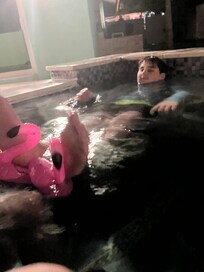 Lounging in the hot tub