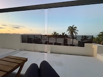 The "deluxe ocean view" while seated on the balcony