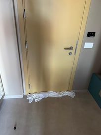 Put wet towels under the door to keep toxic fumes outside the room.