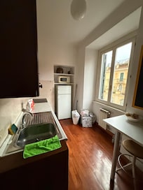Kitchen with dishwasher and washinging machine.