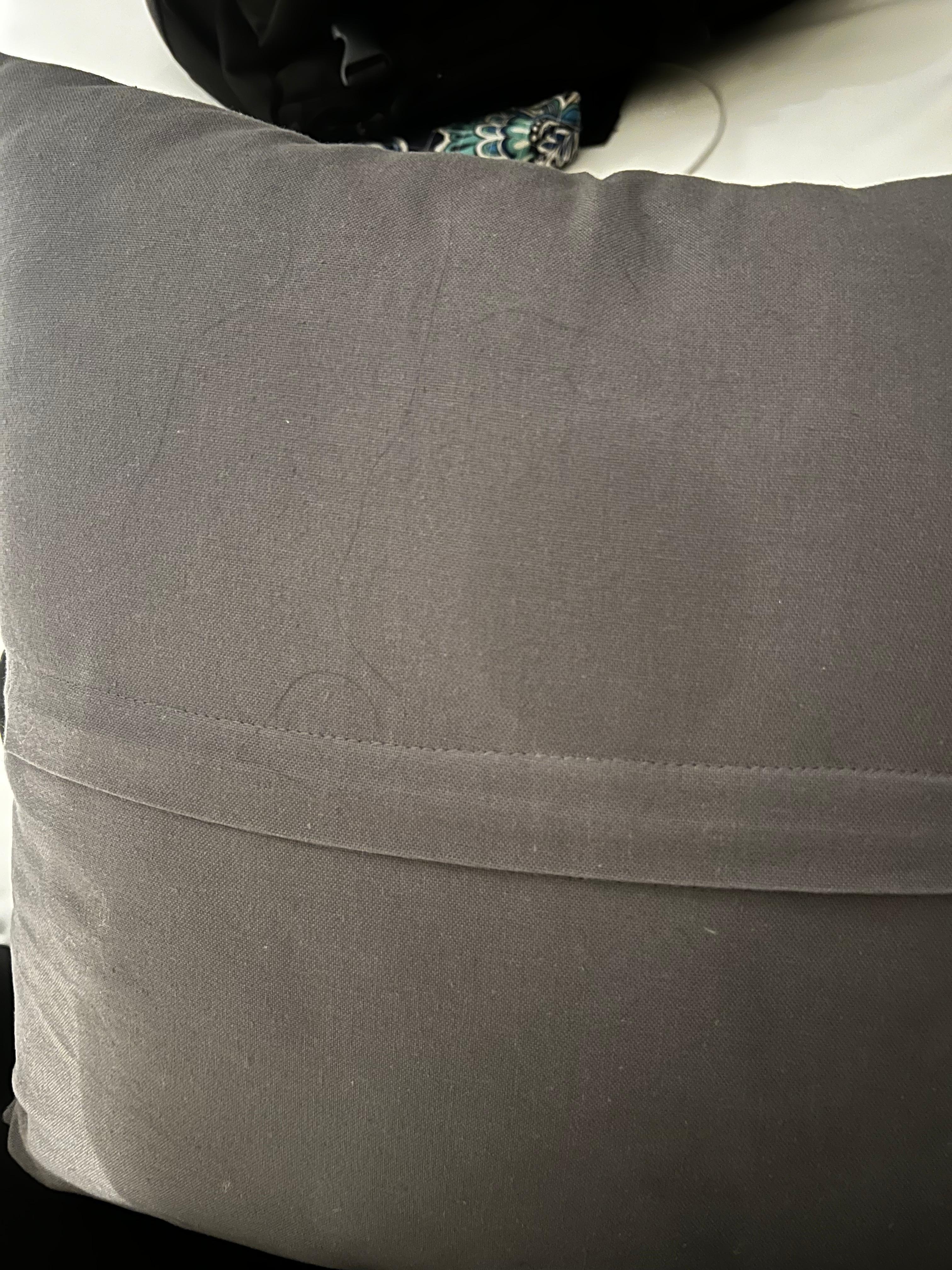 The decor pillow had questionable greasy stains and another guest’s hair behind it on the side touching the linens where we sleep.