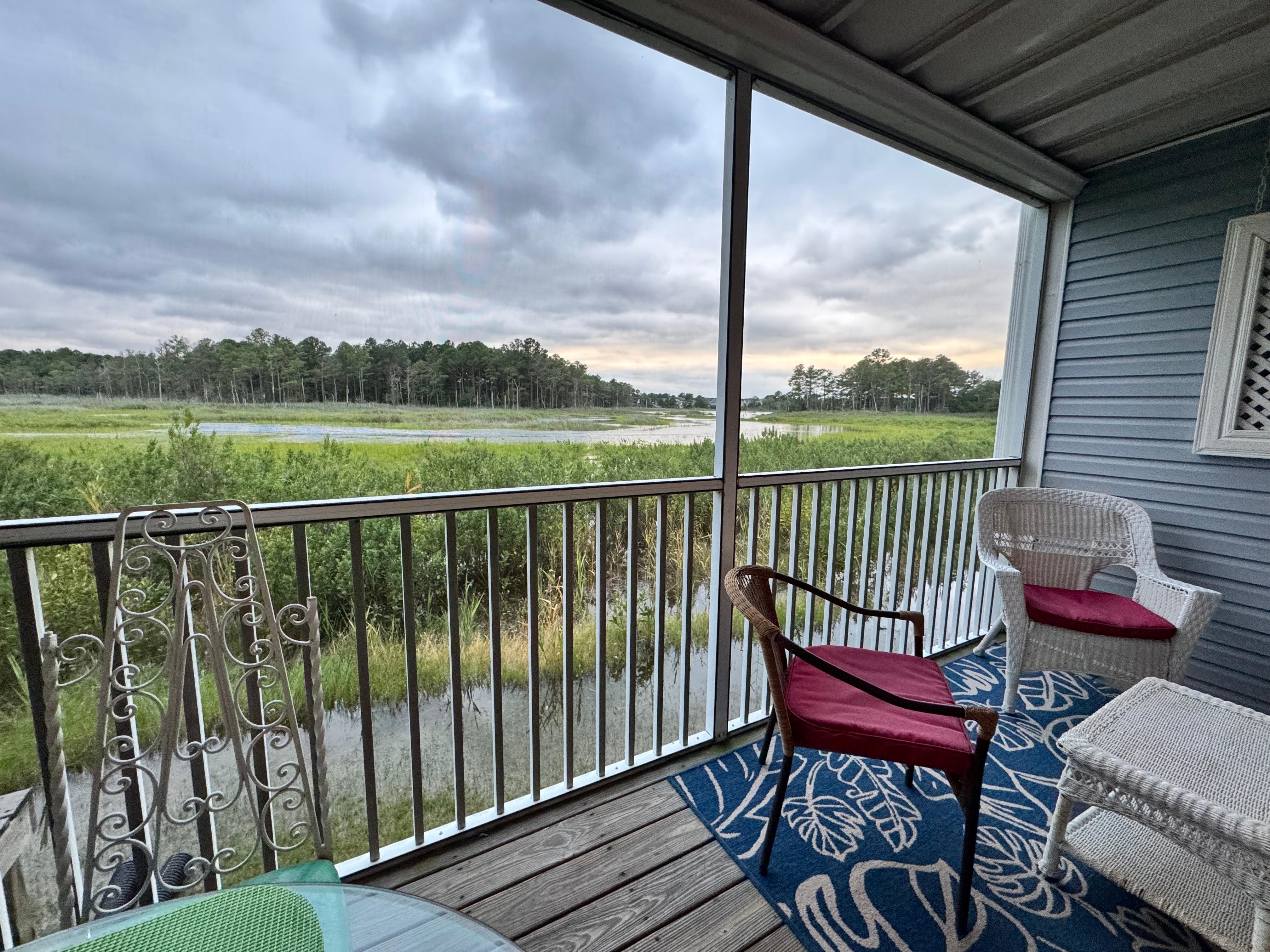 The screened in back patio