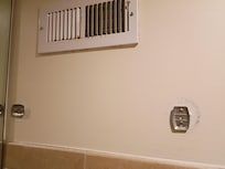 Dirty vent and missing towel bar