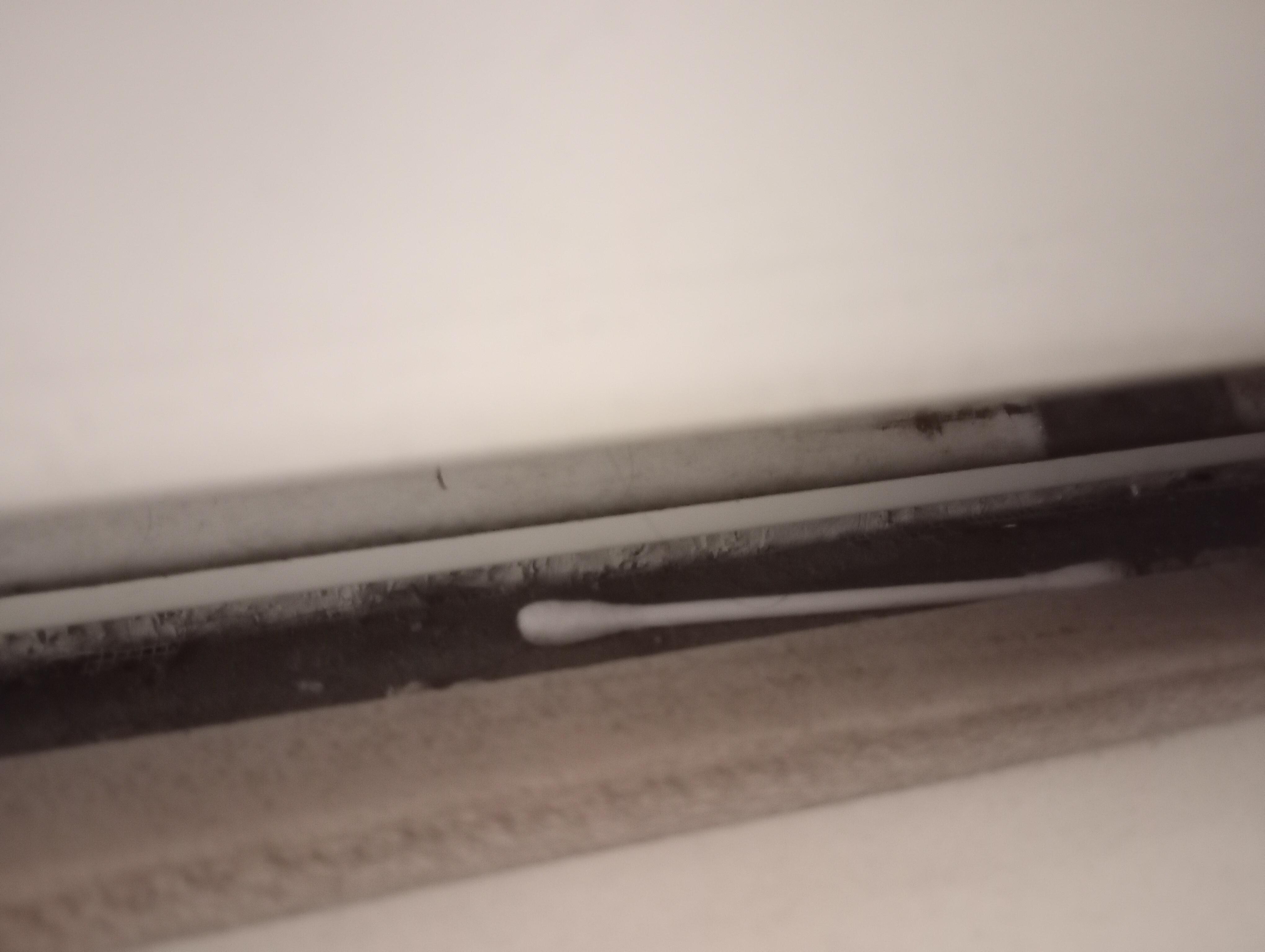 Garbage left under the heater.