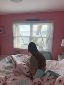 View from one of the stairs bedrooms - right outside onto the sea!