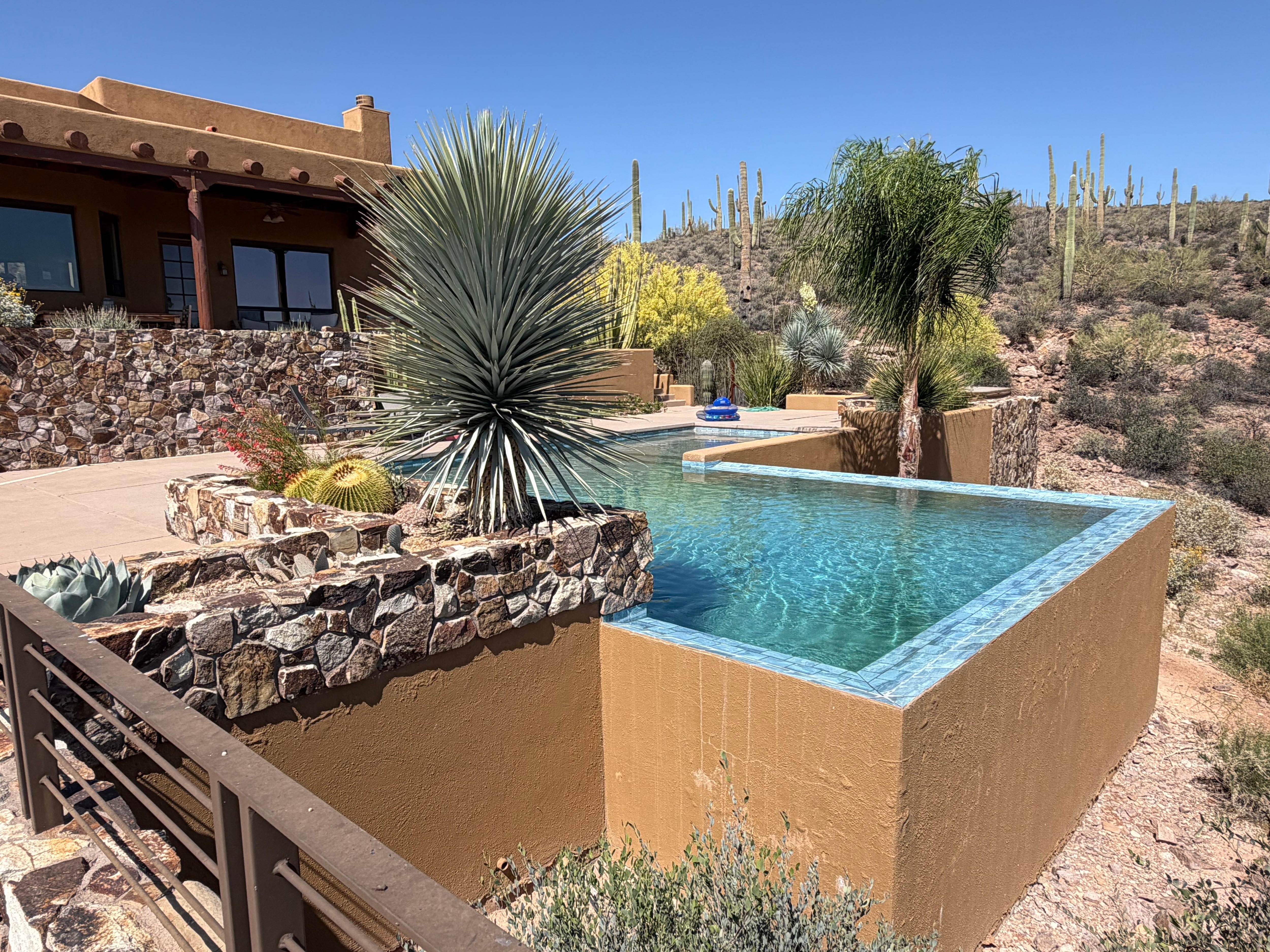 Stunning pool layout. Amazing views in every direction. 