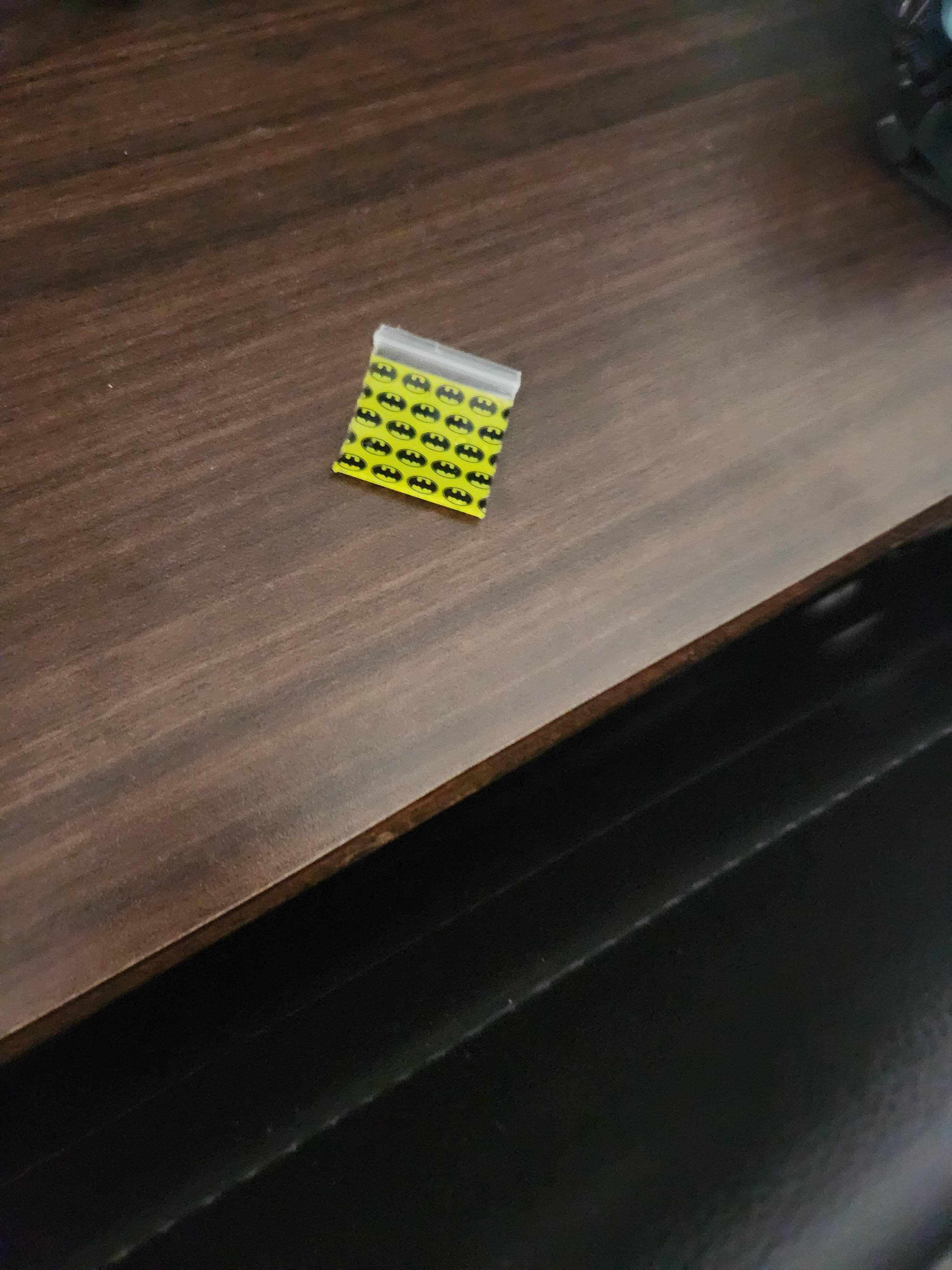 Dime bag found in coffee maker.