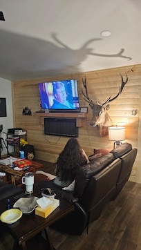 Love the rack on wall cool esthetic to compliment the rustic theme of woods and area.