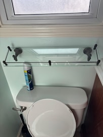 Glass shelf not securely fixed to the wall